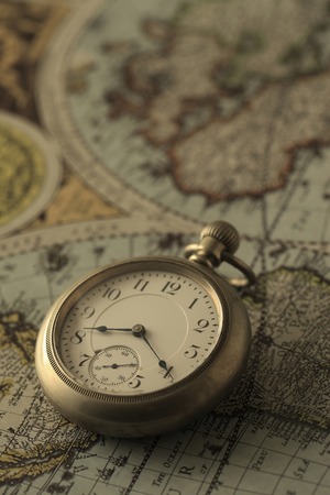 Pocket Watch and old mapsの写真素材