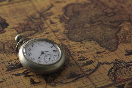 Pocket Watch and old mapsの写真素材