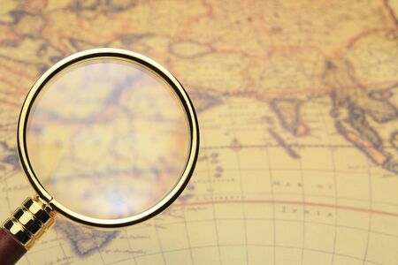 Map and magnifying glass