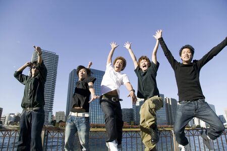 Japanese men jumpingの写真素材