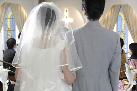 Rear View of the bride and groomの写真素材