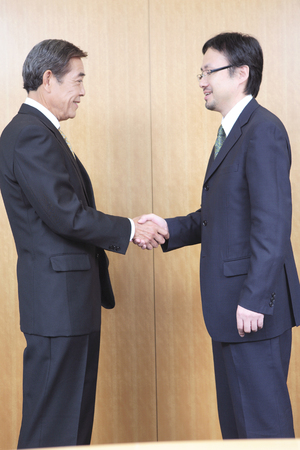 Two people greetの写真素材