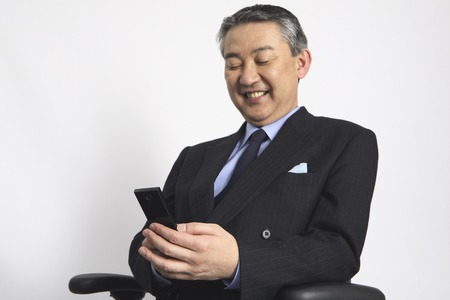 Businessman Read mailの写真素材