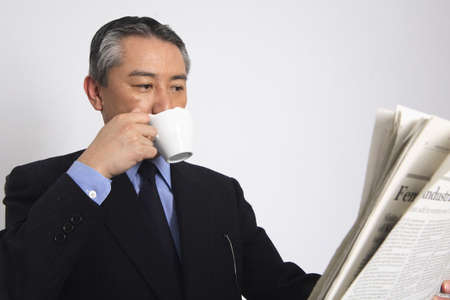 Businessman drinking coffee