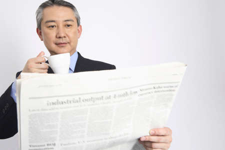 Businessman drinking coffeeの写真素材