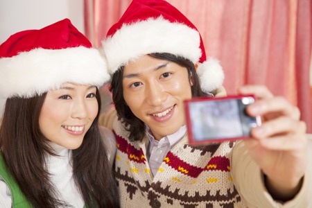 Couple to shoot themselves with a digital camera for Christmas