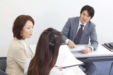 During a meeting of businessmen and OLの写真素材