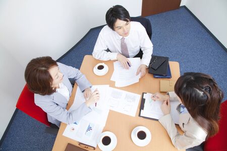 Meeting with businessmen and OLの写真素材