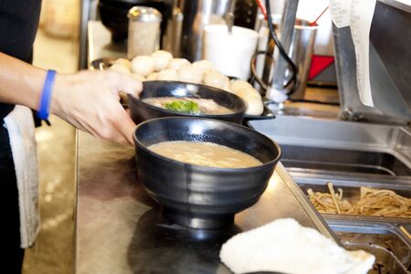 At hand to make ramen noodlesの写真素材