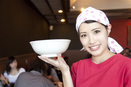 Clerk with ramenの写真素材