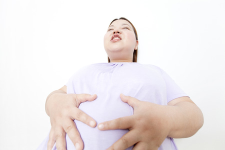 Metabo women rub the tummyの写真素材