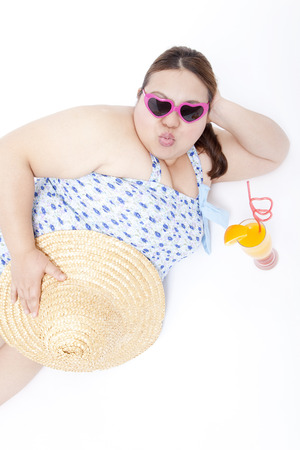 Overweight women to enjoy a vacationの写真素材
