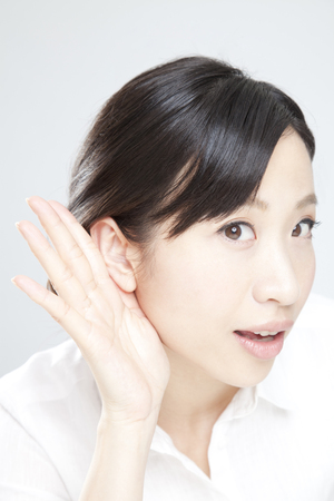 Women Hands On earの写真素材
