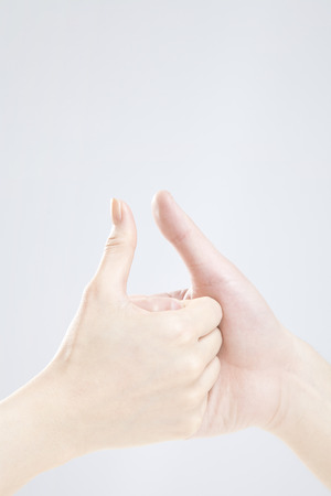 Men and women to be thumb wrestlingの写真素材