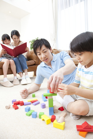 Parent and child to relax in the living roomの写真素材
