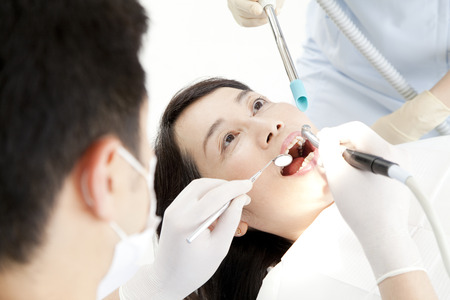 Women who undergo dental treatmentの写真素材