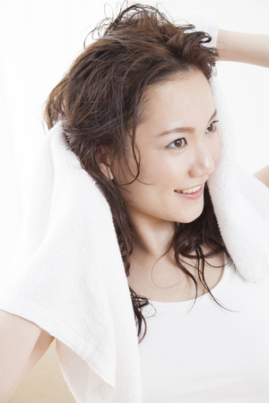 Wipe the hair womenの写真素材