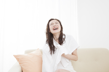 Wipe the hair womenの写真素材