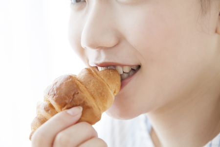 Women who eat breadの写真素材
