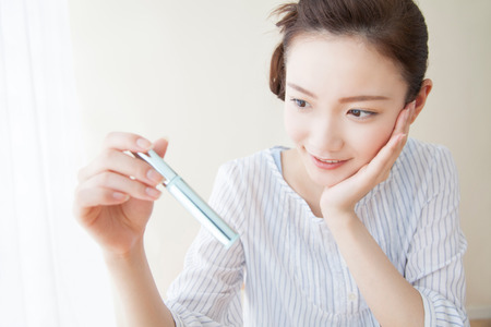 Women who choose the cosmeticsの写真素材