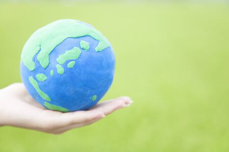 Globe topped in handの写真素材