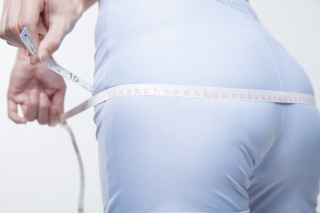 Woman to measure the hipの写真素材