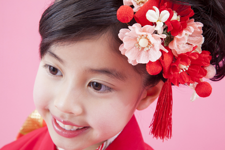 Baby girl smiling in furisodeの写真素材
