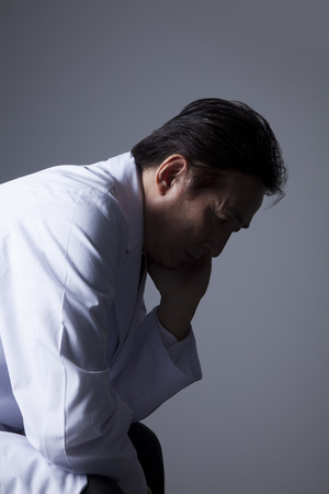 The worry veteran doctorの写真素材