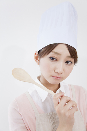 Women suffering and wearing a toqueの写真素材