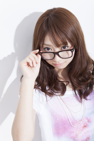 Women smiling and wearing glassesの写真素材