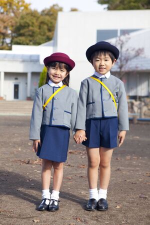 Smile kindergarten children and women