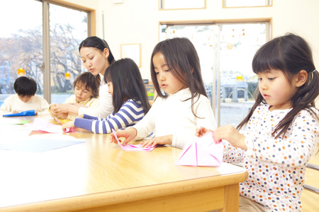 Fold the origami nursery and kindergartenの写真素材