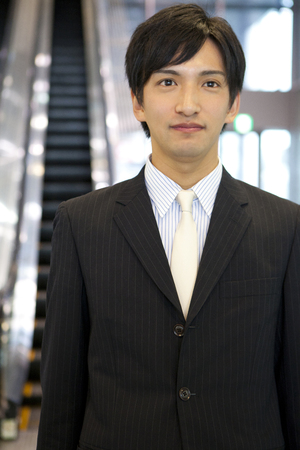 Businessman walking lobbyの写真素材