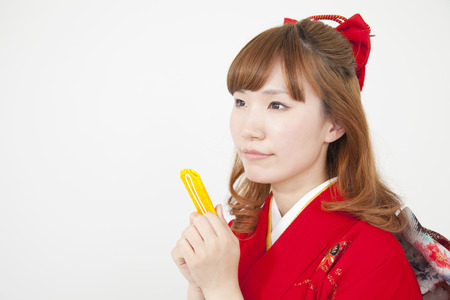 Women kimono figure with amuletの写真素材
