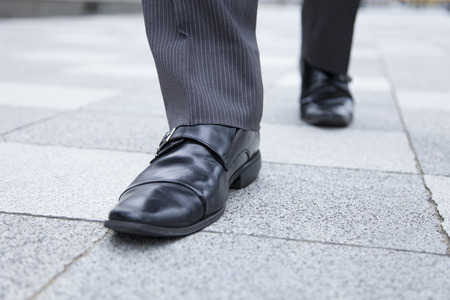 Businessman walking footの写真素材