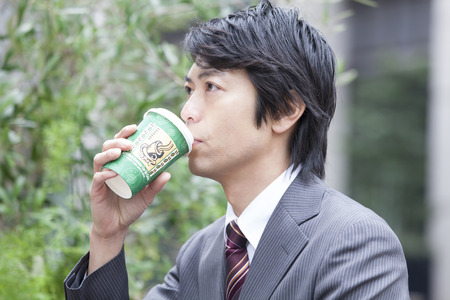 Businessman drinking coffeeの写真素材