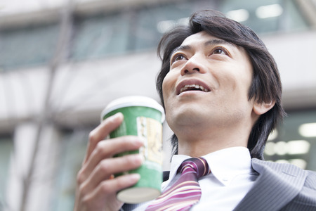 Businessman drinking coffeeの写真素材