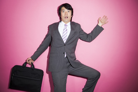 Businessman corneredの写真素材