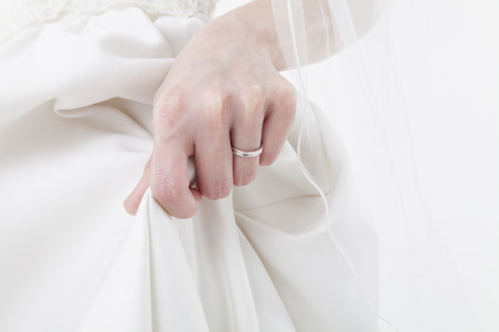 Bride with a hem of the dressの写真素材