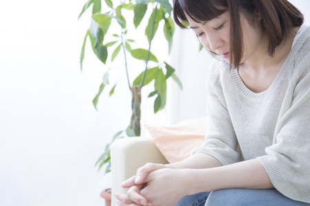 Middle women who look downの写真素材