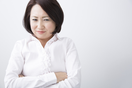 Businesswoman to his arms foldedの写真素材