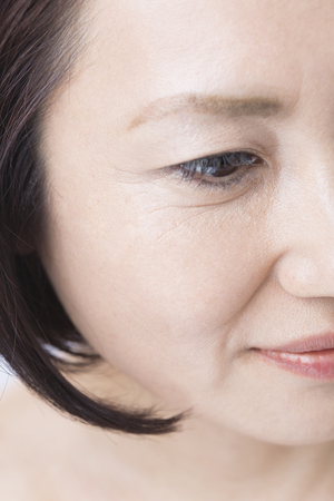 Eyes of middle womanの写真素材