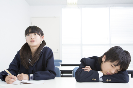 junior high school students snoozeの写真素材