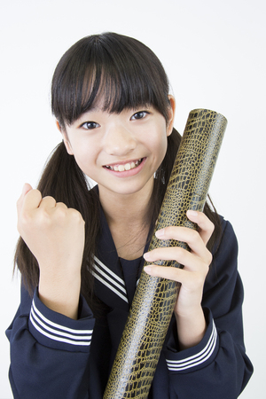 Junior high school girls with a diplomaの写真素材
