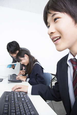 Junior high school students learn computerの写真素材