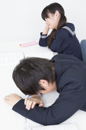 bogged down in study junior high school studentsの写真素材