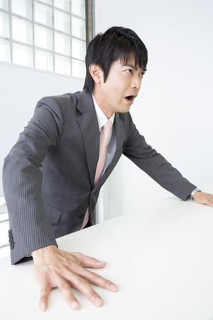 Lecturer to insist on hitting the podiumの写真素材