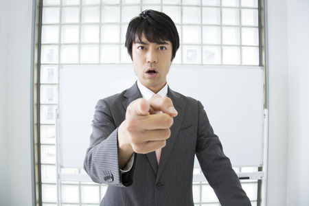 Lecturer towards the student you plug it into fingerの写真素材