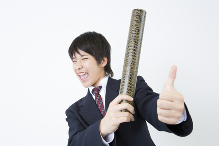 Men's junior high school students with a diplomaの写真素材