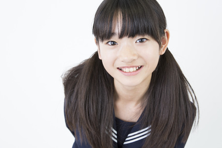 Smiling female junior high school studentsの写真素材
